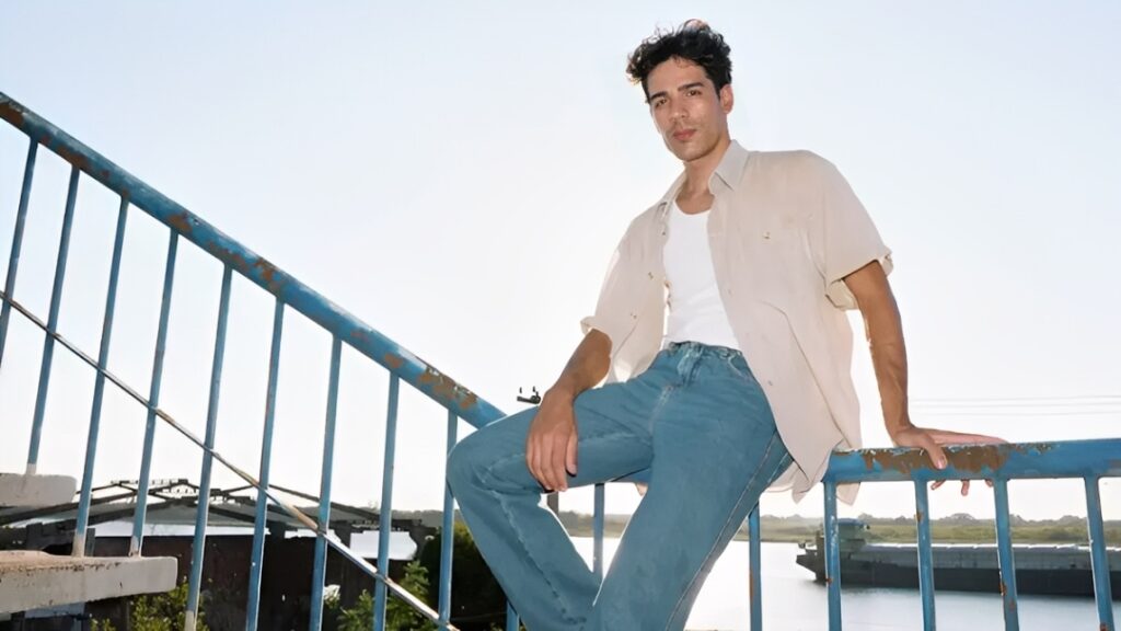 A man sitting on the railing