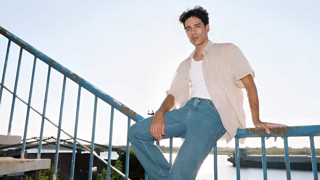 A man sitting on the railing