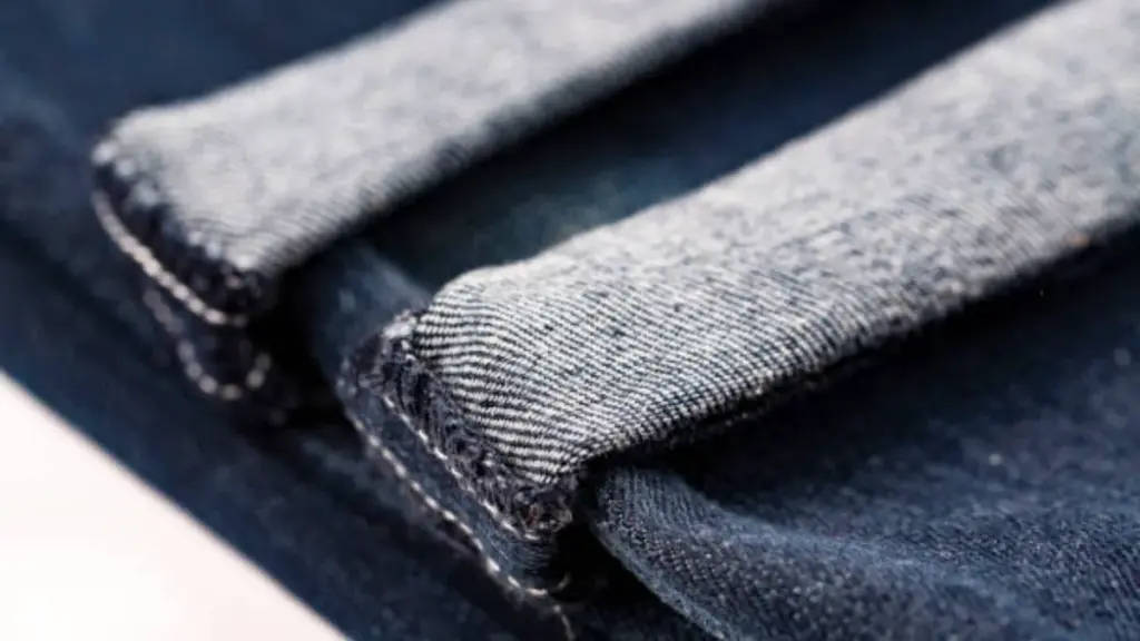 blue denim jeans folded