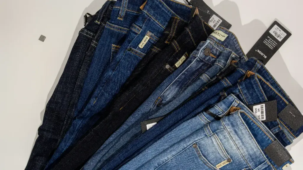 several pairs of denim jeans