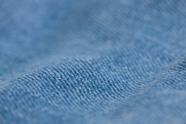 Extreme macro of denim surface. Shallow DOF