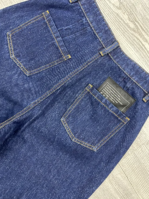 a pair of blue rinse wash denim jean 2