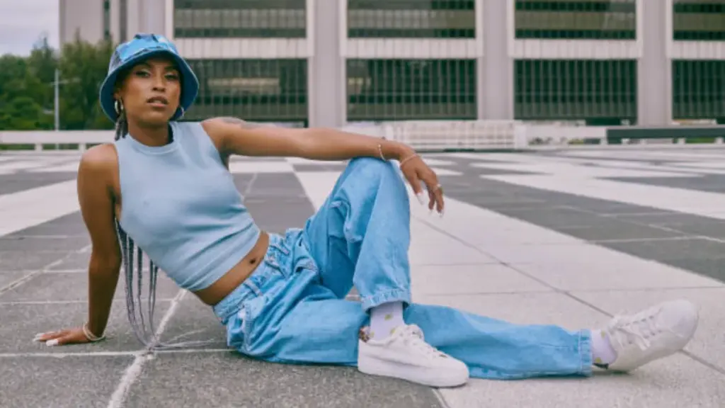 a woman in light wash denim jean