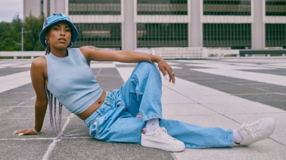 a woman in light wash denim jean