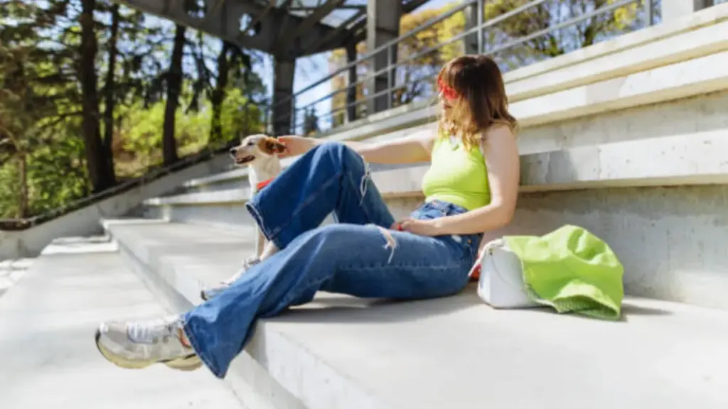 fashionable woman in distressed denim jean