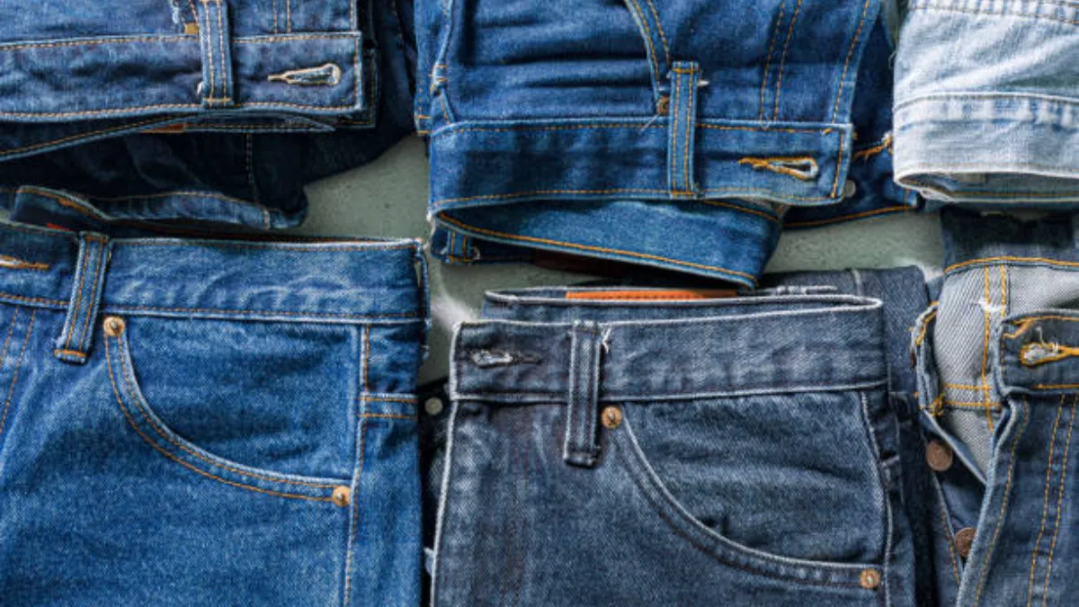 several pairs of denim jeans