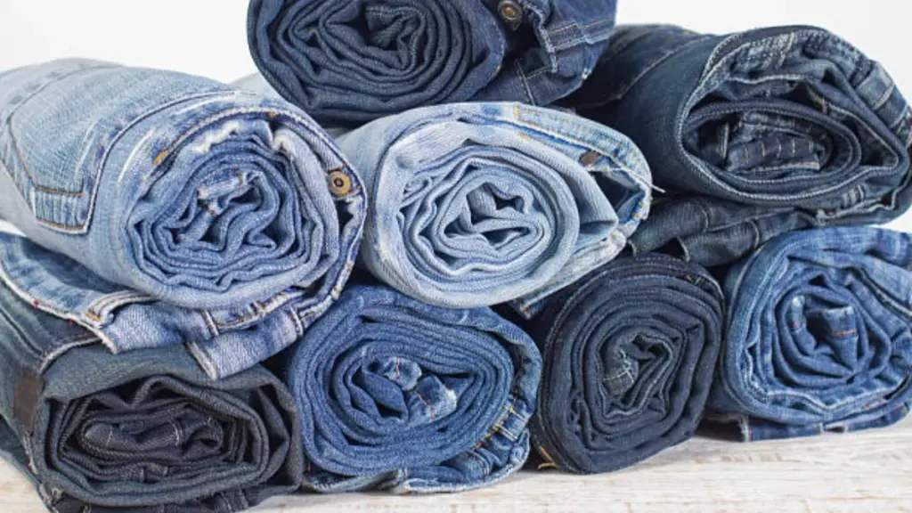 several rolls of denim jeans