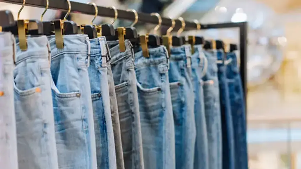 Stylish denim jeans clothing store stands showcase boutique